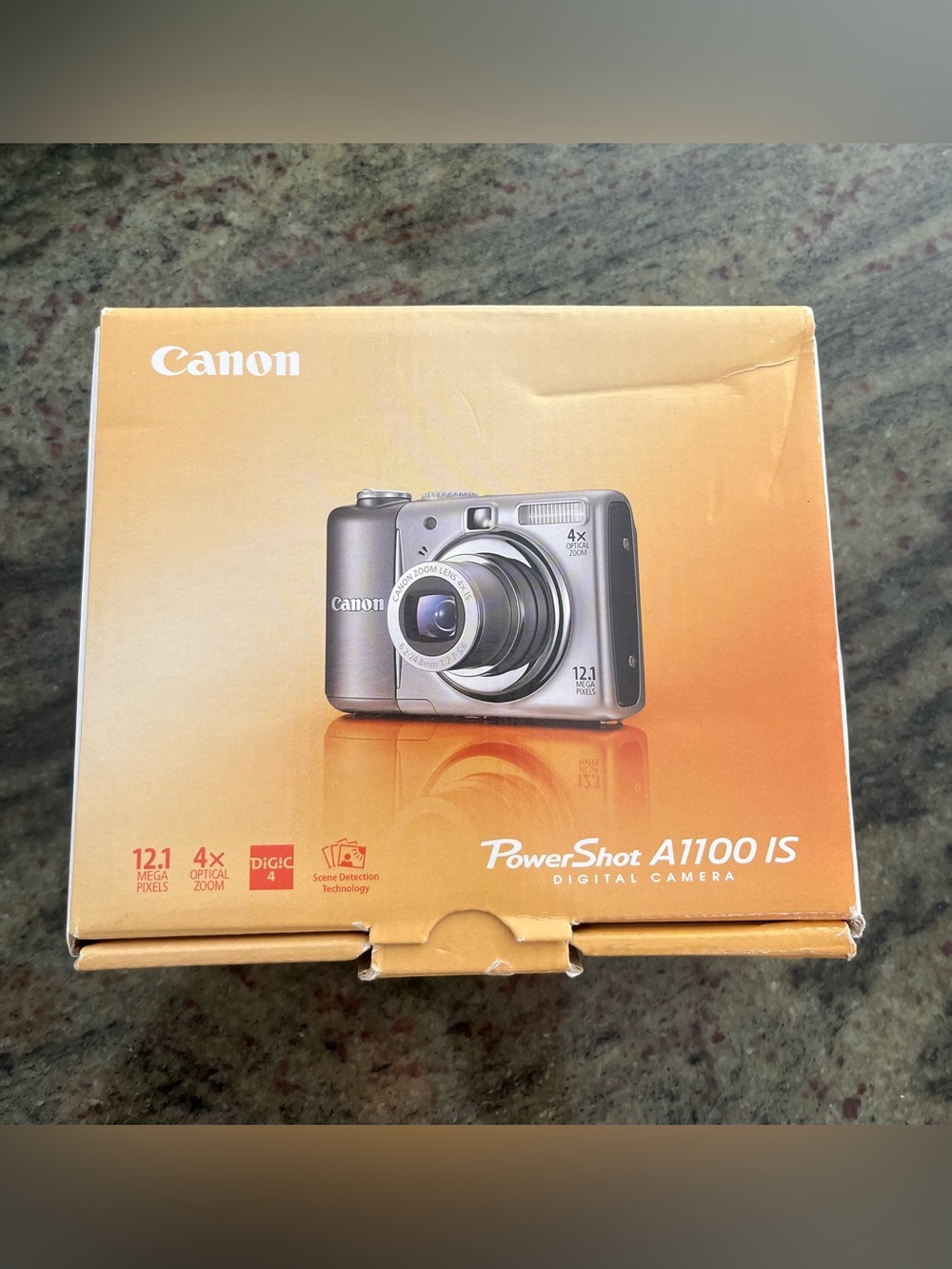 Canon PowerShot A1100 IS 12.1MP
Digital Camera, In Original Box +
Accessories